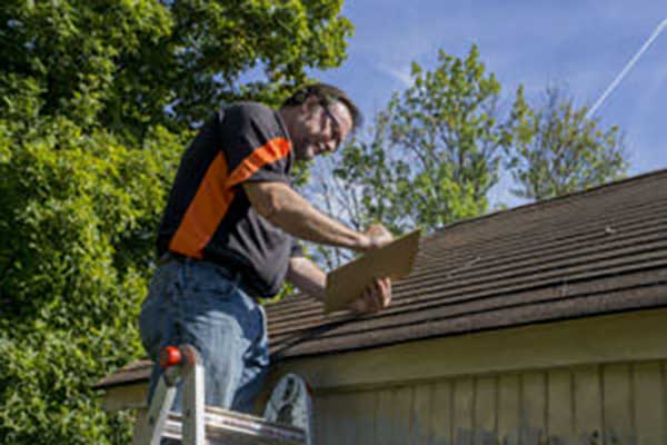 Hail Damage Lp Image Northwest Ar Top Hat Chimney Roofing 300x200 1